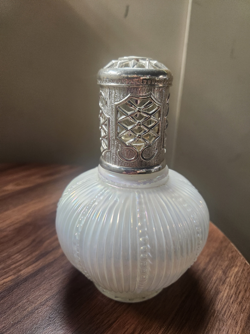 Iridescent White Glass Perfume Bottle with Ornate Silver Cap